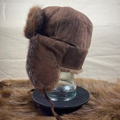 Made With Genuine Beaver Fur, Short Haired And Course Material. Made In Usa Manufactured By Kastoria Furs Brown Hats With Ear Flaps For Cold Weather, Brown Ear Flaps Hat For Cold Weather, Winter Outdoor Fur Felt Hat, Winter Fur Felt Hats For Cold Weather, Brown Short Brim Hat For Cold Weather, Vintage Fur Felt Hat For Winter, Vintage Winter Fur Felt Hat, Fitted Winter Outdoor Hat, Fitted Fur Felt Winter Hats