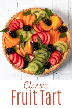 a fresh fruit tart on a plate with the words fresh fruit tart above it