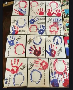 many handprints are displayed on the table