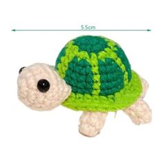 a crocheted turtle toy is shown with the measurements for it's head