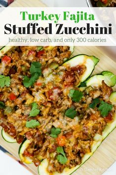 an image of stuffed zucchini with meat and vegetables on the plate in front