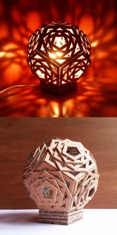 two different types of paper sculptures on a wooden surface and one with a light in the middle