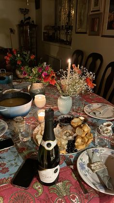 a table is set with food and wine