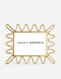 a gold frame with the words luu and georgia on it