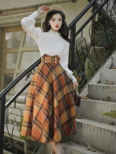 This luxurious Dark Academia Skirt is the epitome of classic dark academia sophistication and taste. Crafted from high-quality wool, its classic midi length and high waist create a flattering silhouette. The timeless plaid pattern and A-line silhouette add a touch of vintage 50s elegance. Skirt size S Waist: 66cm Length: 84cm Skirt size M Waist: 70cm Length: 85cm Skirt size L Waist: 74cm Length: 86cm Skirt size XL Waist: 78cm Length: 87cm Luxury High-waist Skirt For Fall, Luxury Feminine Fall Skirt, Luxury Fall A-line Skirt, Skirt Knee High, Luxury Full Skirt For Fall, Plaid A Line Skirt Outfit, Asian Woman Style Outfit, A-line Bottoms For Formal Fall Events, Formal Long Skirt For Fall