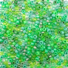 green and white beads are arranged together