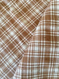 brown and white checkered fabric