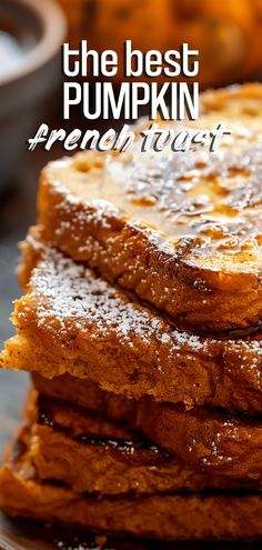 the best pumpkin french toast with powdered sugar on top is piled high and ready to be eaten