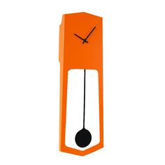 an orange clock with black hands is on the wall and has two pendulums attached to it