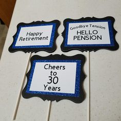 there are three signs that say happy retirement, hello pension and cheers to 30 years