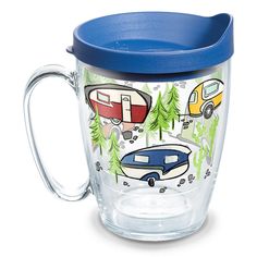 a glass cup with a blue lid and an image of campers on the side