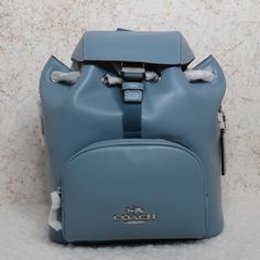 Coach Pace Backpack (Cr100) Cornflower Blue Smooth Leather. Drawstring And Speed Clip Closures. Exterior Zip Pocket. Interior And Exterior Zip Pockets. Adjustable Shoulder Straps. Silver Hardware. 9.5" (W) X 8.75" (H) Blue Tote Backpack For On-the-go, Blue Tote Backpack With Adjustable Strap, Light Blue Travel Backpack, Blue Tote Backpack With Removable Pouch, Rectangular Blue Backpack, Designer Blue Backpack, Light Blue Coach Bags, Blue Backpack With Removable Pouch, Blue Standard Backpack With Removable Pouch