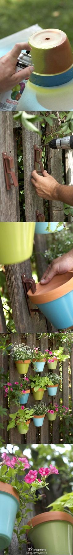 several bowls are stacked on top of each other in front of trees and water lilies