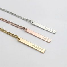 High Quality Stainless Steel Vertical Name Bar Necklace With Free EngravingPersonalize it FREE 1 line up to 20 CharactersBoth sides engrave additional $4.00 Product Info:Material: Stainless SteelSize Pendant Height: 1.37" inchesSize Pendant Width: .19" inchesSize Necklace: 16" + 2" extension Engraved Promise Rings, Silver Claddagh Ring, Baguette Engagement Ring, Forever Gifts, Stacking Ring Set, Engagement Ring White Gold, Gold Ring Stack, Bridal Bands, Engraved Gifts