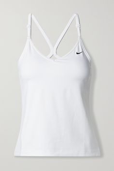 Nike's 'Indy' tank is perfect for low-impact workouts like walking and Pilates. Designed with lightly padded cups, it's made from the label's Dri-FIT fabric and blended with 72% recycled-polyester. Wear it with your favorite leggings.<br><br>This product Reduces Waste. Find out more about NET SUSTAIN <a href="https://www.net-a-porter.com/en-gb/campaigns/net-sustain">here.</a> Nike Tennis Clothes, White Activewear, Nike Tank Top, Tennis Top, Workout Clothing, Sporty Tank Top, Nike Top, Workout Clothes Women, Fitness Shirts