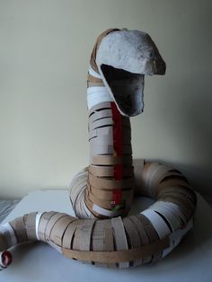 the snake is made out of cardboard and tape