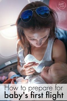 a woman holding a baby in her arms with the words how to prepare for baby's first flight