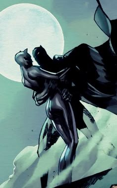 a batman standing on top of a snow covered hill next to a giant white moon