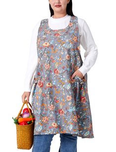 a woman in an apron holding a basket