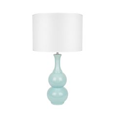 a light blue table lamp with a white shade on the top and bottom, in front of a white background