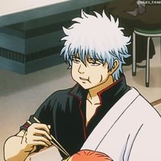 an anime character with white hair is cutting another person's hair in the kitchen