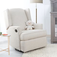 a white chair with a stuffed animal on it