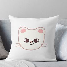 a white cat with brown eyes and pink ears on it's face throw pillow