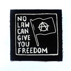 a black and white patch with the words no law can give you freedom