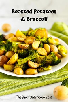 roasted potatoes and broccoli on a white plate