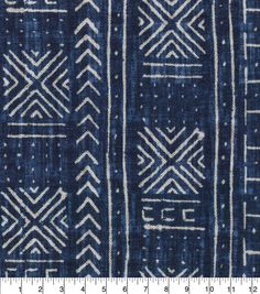 an old blue and white cloth with geometric designs on the side, as if it were woven