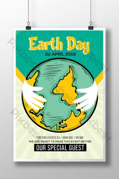 an earth day poster hanging on a wall