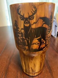 a wooden cup sitting on top of a table