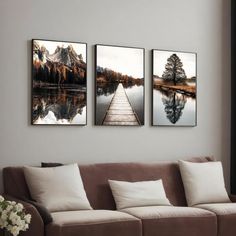 three pictures hanging on the wall above a couch