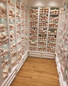 a room filled with lots of shelves full of donuts