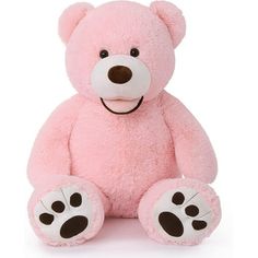 a pink teddy bear sitting on the ground with its paw prints painted on it's chest