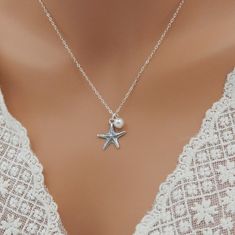 These 7 high quality necklaces are perfect for a beach wedding. Each sterling silver necklace is approximately 18 inches long** and features a 6mm crystal pearl (5 colors available) and a detailed sterling silver starfish charm. A spring-ring clasp completes the necklace. Each comes in a gift box. **IMPORTANT: Default necklace measures 18 inches long but is available in ANY length(s) - note at checkout. EARRINGS: Sterling silver matching earrings also available (not included). Summer Jewelry Silver, Silver Summer Jewelry, Sophie Outfit, Beach Silver Jewelry, Summer Necklace Beach, 5 Bridesmaids, Necklaces Beach, Bridesmaid Pearl Necklace, Beachy Necklace