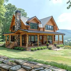 a large log home with stone steps leading up to it