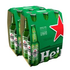 four heineken beer bottles are stacked on top of each other in a cardboard box