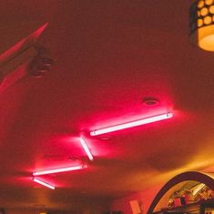 red lights are on the ceiling in a restaurant