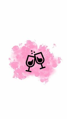 two glasses of wine are in front of a pink spot