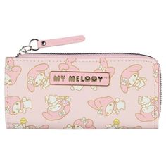 Add a touch of cute mischief to your accessories with this My Melody Kuromi wallet! Crafted from faux leather, it showcases an allover pink design featuring Kuromi in multiple playful poses, capturing her sweet and sassy charm. The front is accented with a metal My Melody logo badge for an extra dose of style. Inside, you'll find eight card slots, two bill sleeves, and a zippered coin pocket, all secured by a full zip-around closure to keep your essentials safe. Whether you're heading out for er Kuromi Wallet, Kuromi Design, Leather Front Pocket Wallet, Playful Poses, Leather Credit Card Holder, Credit Card Holder Wallet, Card Purse, Front Pocket Wallet, Logo Badge