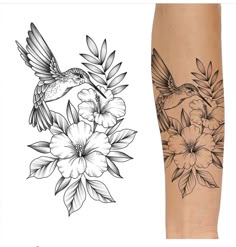 a tattoo design with flowers and a hummingbird on the left side of the leg