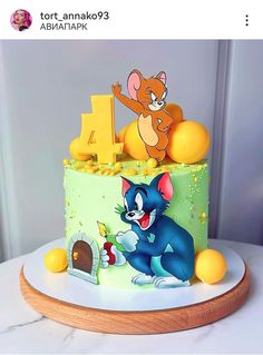 a birthday cake with cartoon characters on it