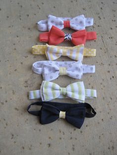 five bow ties laid out on the ground