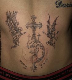 a man with tattoos on his stomach has a cross and an angel tattoo on his back