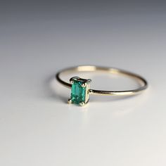 14k Gold Dainty Emerald Ring, Emerald Cut Minimalist Ring Senior Ring, Emerald Cut Emerald Ring, Emerald Gold Ring, Jewelry Design Studio, May Birthstone Rings, Emerald Rings, Garnet Jewelry, Emerald Engagement, Gold Band Ring