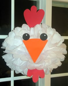 an image of a paper wreath with a chicken on it's head and the words la manera ma