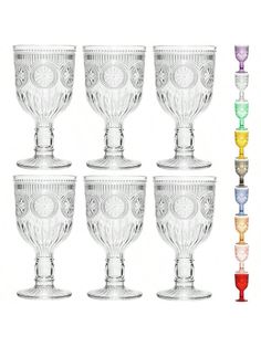 six different colored glass goblets sitting next to each other on a white background