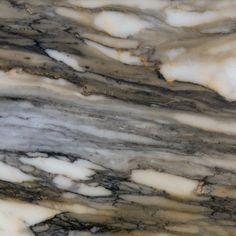 the marble is white and black with brown spots