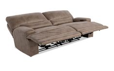 the reclining sofa has two seats and is attached to it's back end